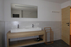 Washstand in larger bathroom